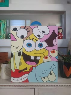 an image of cartoon characters painted on canvases