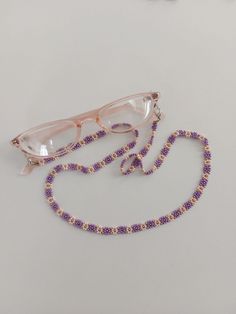 This handmade glasses strap is hand-woven with the highest quality glass beads.  There are stainless apparatus at both ends.  Length is 27 inches.  You will attract attention in your environment with your glasses strings.  You can use daisy glasses lanyard easily in all seasons. Summer Beaded Glass Necklaces For Gifts, Summer Glass Beaded Necklaces For Gifts, Summer Glass Beaded Necklaces As Gifts, Summer Gift Glass Beaded Necklaces, Handmade Everyday Beaded Necklaces, Trendy Handmade Glass Beaded Necklace, Handmade White Glasses Chains As Gift, Handmade Adjustable Pink Glasses Chains, Glass Glasses Chains With Colorful Beads For Gifts