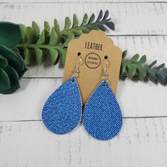 "These small denim blue leather teardrop leaf shape earrings make a great statement, yet simple and easy for everyday wear.  They feature a textured leather in a denim blue jeans print and are very soft and pliable.  They are also lightweight and are sure to pair perfectly with any outfit!  They also make great gifts for moms, daughters, grandmothers, sisters, friends, teachers, coworkers, and more! *Size = Small = 2\" long x 1.25\" wide with a drop length of 2.5\" *last photo shows other styles and sizes listed elsewhere in the store - these are the Small Teardrop* *Thickness = 1.2mm = average* > Durable > Noise free > Affordable > Nickel free fishhook ear wire > Rubber backs included so you can wear them without losing one! I have a variety of colors and styles to choose from so be sure Trendy Blue Dangle Teardrop Earrings, Trendy Blue Teardrop Earrings For Gifting, Trendy Blue Teardrop Earrings For Gift, Trendy Blue Teardrop Earrings Gift, Everyday Blue Dangle Teardrop Earrings, Jeans Print, Wine Bottle Topper, Gifts For Moms, Petal Earrings