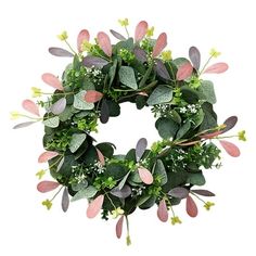 a green wreath with pink and grey leaves