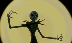 an animated figure with two hands up in front of a full moon