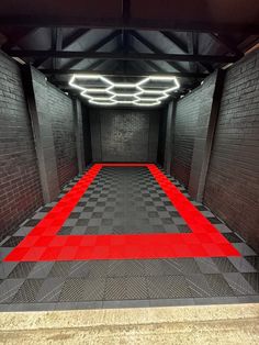 a red and black checkered floor in a building