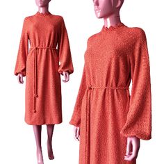 A most darling 60s sweater shift dress in a beautiful, bright coral color. Done in a textured, boucle knit with detailed, crochet-like mockneck and billowy bishop sleeves! Isn’t she lovely? 60s Sweater, Women's Workwear Fashion, 1970's Fashion, Autumn Knitwear, 1960's Fashion, Boucle Knit, Midi Sweater Dress, Boucle Sweater, Wear To Work Dress