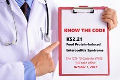 a doctor pointing to a sign that says know the code k521 food protein - linked interrobits syndrome