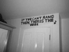 a black and white photo of a bathroom with the words if you can't hang them theres the door