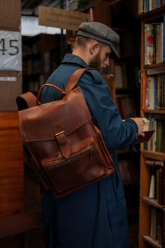 Model Douglas Explore timeless style and rugged durability with our Vintage Leather Backpack. Crafted from premium brown leather, this backpack offers a classic design that suits both men and women. Its spacious interior and sturdy construction make it perfect for daily use, travel, or outdoor adventures. Personalize it with initials for a unique touch, making it an ideal gift for him or her. Whether you're looking for a stylish rucksack or a practical leather bag, this hipster backpack combines Brown Travel Backpack With Multiple Pockets, Brown Backpack With Pockets For Everyday Use, Classic Brown Backpack For Outdoor Use, Classic Leather Adventure Backpack, Brown Leather Backpack With Pockets For Outdoor, Classic Brown Backpack For Outdoor, Brown Leather Rectangular Backpack With Pockets, Brown Leather Backpack For Everyday, Brown Leather Backpack With Pockets For Everyday