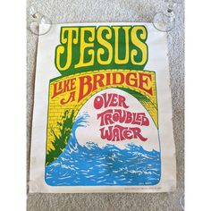 a sign on the ground that says jesus like a bridge over trouble water with an image of a wave coming out of it