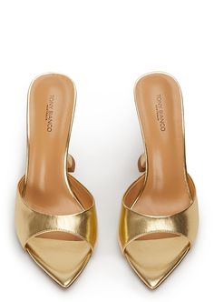 Pointed perfection, the Marcel gold leather mules are designed with a sleek and paired back shape and feature an open pointed toe-shape, a low cut rounded vamp and a chic hourglass shaped heel. With a quality luxe leather upper, lining and cushioned sole this style is not to be missed. -Material: Leather Upper & Lining -Sole: Man-Made -Fit: True to size -Toe-shape: Pointed -Features: Hourglass shaped heel -Heel: 10.5cm Metallic Kitten Heels, Cute Gold Heels, Nude Heels Wedding, Gold Low Heels, Gold Closed Toe Heels, Metallic Gold Shoes, Gold Shoes Heels, Gold Kitten Heels, Gold Mules