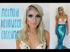 a woman in a mermaid costume posing for the camera with makeup on her face and eyes