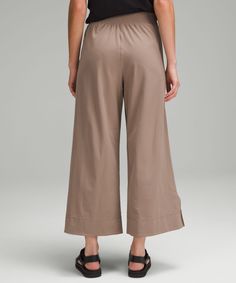 These high-rise, wide-leg crops flow with your every move for an easy approach to your daily routine. Designed for Casual. Relaxed fit is roomy through glutes and thighs:Sits away from body, hip to hem:Intended to sit above ankle. Hand pockets with hidden card sleeve. Cropped Pants Women, Wide Leg Cropped Pants, Card Sleeve, Womens Capris, Back Women, Pants Design, Women Crop, Daily Routine, Cropped Pants