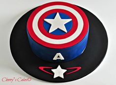 a captain america themed cake with stars on it