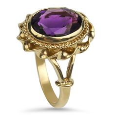 A 9k yellow gold amethyst ring. The ring features a center oval shape amethyst, measuring 9 x 7 mm, estimated at 1.7 carats. The amethyst is bezel set with two outer rims, one with milgrain detail and one with a wavy pattern around the top of the ring and an open shoulder design. Stamped "9 375". Finger size 3.75 Replacement Value: $450 Luxury Amethyst Oval Jewelry, Luxury Fine Jewelry Amethyst Ring With Bezel Setting, Luxury Oval Amethyst Ring In Art Deco Style, Luxury Vintage Amethyst Oval Cabochon Ring, Classic Amethyst Oval Cabochon Ring, Classic Oval Amethyst Ring, Classic Oval Purple Amethyst Ring, Heirloom Style Purple Oval Amethyst Ring, Oval Amethyst Ring In Yellow Gold