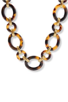 Discover timeless elegance with the Madison Link Necklace from Julie Vos. This stunning piece features polished tortoiseshell ovals and hammered golden links, secured with a matching toggle. Perfectly blending classic and modern elements, this necklace adds a touch of sophistication to any outfit. 24K gold plate, acetate Length: 18.5 / 19.3 / 20 inches (adjustable) Closes with toggle Julie Vos hallmark Julie Vos, Modern Elements, The Madison, Link Necklace, Tortoise Shell, Blending, Hallmark, Timeless Elegance, Gold Plate