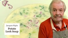 an old man is standing in front of a bowl of soup