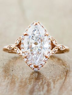 caption:Shown with a 2ct marquise diamond Marquise Engagement Ring Halo, Wedding Ring Diamond Band, Expensive Wedding Rings, Rose Gold Diamond Ring Engagement, Antique Engagement Ring, Ice Water, Dream Engagement Rings, Marquise Cut Diamond, Ring Ideas