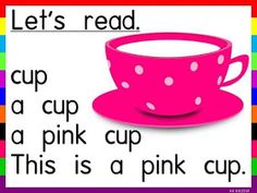 a pink cup with white polka dots on it and the words let's read