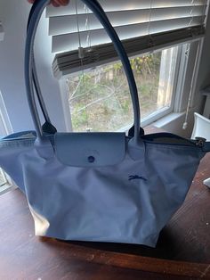 Cute Longchamps tote bag. Folds down for storage. Good used condition see pics. Used it for a week. Blue Longchamp, 6th Form, Longchamp Bag, Medium Tote Bag, Christmas Deals, Medium Tote, Baby Bag, Baby Blue, Bathing Beauties