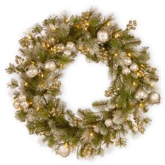 a christmas wreath with silver and gold ornaments