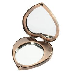 an open compact mirror on a white background