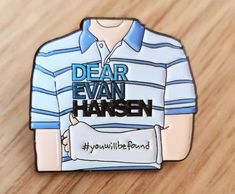 a pin with the words dear evan on it