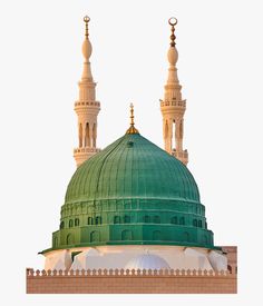 an ornate green and white dome on top of a building with two minalis in the background