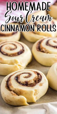 homemade cinnamon rolls on a baking sheet with text overlay