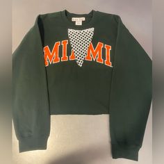 Brand New Reworked Miami Mesh Cropped Sweatshirt Unisex Medium Have 1 Green And 1 Orange Casual Orange Tops For College, Casual Orange College Tops, Green Crew Neck Top For Game Day, Sporty Orange Tops For Game Day, Sporty Orange Tops For Fall, Orange Graphic Print Top For College, Casual Orange Tops For Game Day, Orange Long Sleeve Top For College, Long Sleeve Orange Tops For College