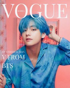 a man with blue hair on the cover of a magazine