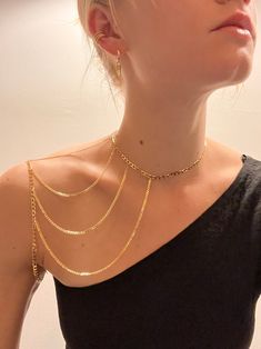 This stunning 24k gold filled flat figaro chain shoulder piece is custom made to your measurements for the perfect fit. Elegant and edgy, this eye catching piece goes great with an asymmetrical neck line. It is hypoallergenic for sensitive skin.  Please allow 4-6 weeks for production and delivery. Gold Plated Figaro Chain Necklace For Party, Minimalist Gold Body Chain, Yellow Gold Choker Chain Necklace For Party, Gold Dainty Body Jewelry For Party, Dainty Gold Body Chain For Party, Trendy Gold Body Chain With Delicate Details, Minimalist Gold Clavicle Body Chain, Chic Gold Body Chain For Evening, Gold Delicate Chain Body Jewelry For Party