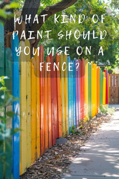 a colorful fence with the words what kind of paint should you use on a fence?