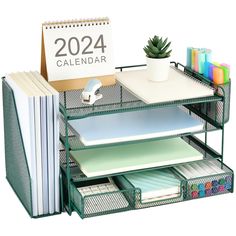 the desk organizer is organized and ready to be used as a calendar, file folders, books, pens, and other office supplies