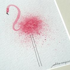 a pink flamingo splattered on white paper