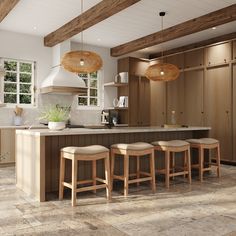 a large kitchen with wooden cabinets and stools