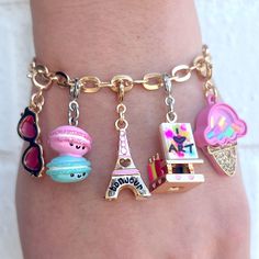 These macarons are always ready to add one more buddy and your CHARM IT! girl is the perfect candidate! Add this charm to any CHARM IT! bracelet or necklace and customize her collection! features & materials 3-Dimensional Enamel, Glitter, Poly Resin, Base Metal WARNING: Choking Hazard - Small parts. Not for children under 3 years. Charm It, Sports Girl, Unicorn Charm, Food Charms, Gold Chain Bracelet, Heart Sunglasses, Pink Sparkle, Gold Bracelet Chain, Creative Branding