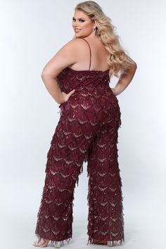 Sydney's Closet SC9108 Long Plus Size Sequin Fringe Jumpsuit Formal Pockets V-Neck. Dazzle the night away in this sparkling Sydney's Closet SC9108 jumpsuit! Adorned with shimmery sequins and fringe details, it features pockets, a flattering V-Neck, and a long silhouette that’s perfect for the dancefloor! Boom-diggity, you’re ready to boogie! SC9108 Sequin fringe Jumpsuit Spaghetti straps covered in sequins V-neckline Pockets Natural waistline Wide leg pant Sizes: 14,16,18,20,22,24,26,28 Colors: Fringe Jumpsuit, Prom Jumpsuit, Sangria Red, Strappy Jumpsuit, Fringe Fabric, Plus Size Prom, Plus Size Formal, Plus Size Formal Dresses, Twist Style