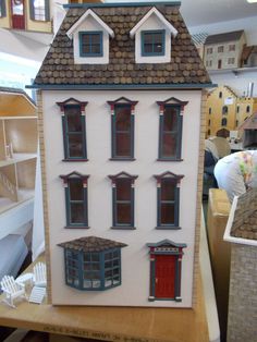 a doll house is on display in a store