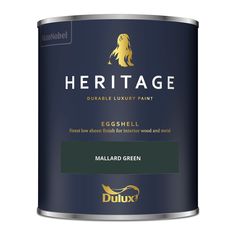 a can of dulux's heritage egghell paint with gold foil on it