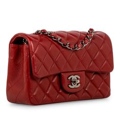 Hello gorgeous...uh...we mean flawless. The mini rectangle flap bag is...an absolute vision. We love her, to say the very least. Crafted from Red lambskin leather with silver-tone hardware, this perfect little baby is definitely hard to get your hands on. The perfect accessory for basically anything, this mini Chanel is the ideal compliment to any outfit for any occasion. Wear her with a cocktail dress and a pair of heels, or with black trousers with a silk blouse, or even with a pair of jeans and a basic tee - no matter what, this gorgeous bag is a suitable compliment. I mean, you can basically wear a plastic bag and you'll still look bomb with the mini rectangle by your side. A bag you'll wear and love forever, investing in a Classic Flap is always a good idea given that they rarely ceas Red Chanel Bag, Fossil Bags Women, Mini Chanel, Women Bags Fashion Handbags, Wedding Handbag, Red Chanel, Classic Flap Bag, Handbag Heaven, Black Trousers