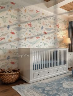 a baby's room with a crib, dresser and wallpaper in it