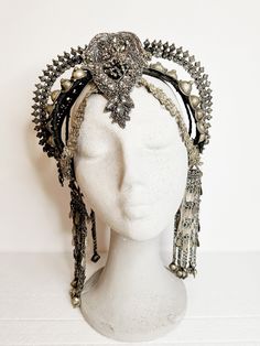 Indulge your inner goddess with this exquisite Afghan tribal headpiece, a bold statement piece that exudes power and elegance. Handcrafted with a mix of intricate beads, embroideries, vintage rhinestones, and luxurious vegan leather, this stunning headpiece is a true work of art. Whether you're heading to a festival, a stage show, or a special performance, this headpiece is designed to make you stand out from the crowd with its captivating glamour and tribal allure. Crafted for comfort and light Belly Dance Costume, Belly Dance Costumes, Costume Hats, Head Accessories, Vintage Rhinestone, Hair Piece, Hair Designs, Belly Dance, Dance Costumes