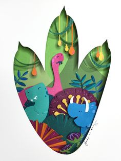 a paper cut out of an animal and bird in the jungle with leaves on it