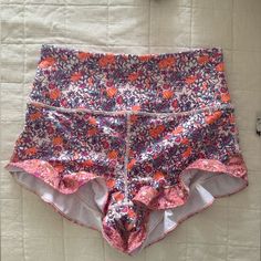 Free People Pli All Day Ruffle Lounge Active Yoga Shorts Stretch Multicolor Floral Print Shorts, Stretch Ruffle Shorts For Loungewear, Stretch Ruffled Shorts For Loungewear, Multicolor Stretch Floral Print Shorts, High-waisted Pink Ruffled Shorts, Pink Stretch Bottoms With Ruffles, High Waist Pink Ruffled Shorts, Stretch Pink Bottoms With Ruffles, Pink Stretch Ruffles Bottoms