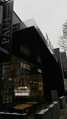 an outside view of a restaurant called paul