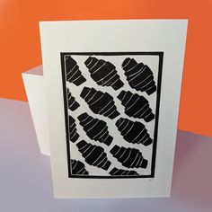 a black and white card with an animal print