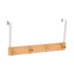 a wooden shelf with three hooks on it