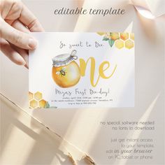 a person holding up a card with a honey jar on it and the words, be sweet to bees one more first birthday