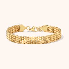 The Vintage Mesh Bracelet is a classic piece that adds a touch of elegance to any outfit. Made of high-quality materials, this bracelet is designed to withstand the test of time. The intricate mesh design is both beautiful and functional, allowing for comfortable wear all day long. Gold Mesh Bracelets, Modern Gold Jewelry, Mesh Bracelet, Mesh Design, The Test, The Vintage, Gold Jewelry, Mesh, Bracelet