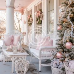 the porch is decorated for christmas with pink and white decorations on the trees, wicker chairs and other items