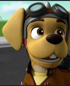 a cartoon dog wearing a pilot's hat and goggles