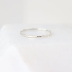 This hammered gold filled or sterling silver stacking ring is super slim, textured, and comes made to order in your size! Our gold stacking rings are perfectly dainty for wearing alone, as a knuckle ring or as a set. Please select a size, quantity, and your preference for rose gold filled, yellow gold filled or sterling silver at checkout. {What will I receive?}: * ONE ring (order more using the drop-down quantity menu) * Your choice of 14k YELLOW gold fill, ROSE gold fill or sterling SILVER. ►S Minimalist Hammered Sterling Silver Midi Rings, Everyday Minimalist Hammered Midi Rings, Hammered Sterling Silver Midi Rings, Minimalist Hammered Stackable Rings, Dainty Hammered Rings, Gold Stacking Rings, Sterling Silver Stacking Rings, Zierlicher Ring, Knuckle Ring